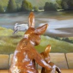 Bunnies looking at the painting